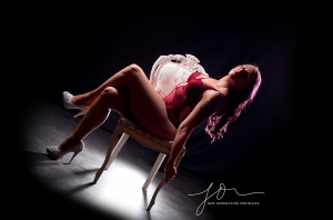Boudoir poses on a chair in our studio. Captured by New Generation Portraits Ltd