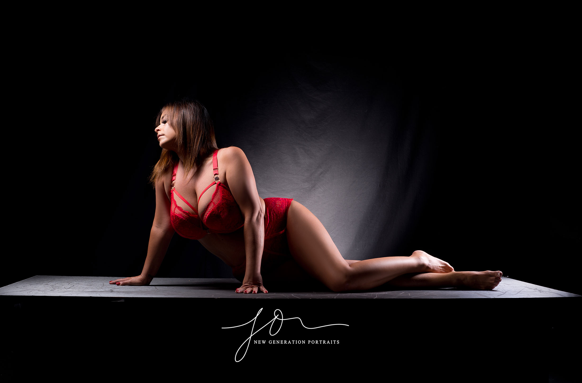 Boudoir pose on our platform set. Sedigned to flatter every lady. Captured by New Generation Portraits Ltd