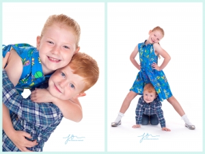 Brother and sister posing for their sibling photo shoot at our Wirral Studio. Captured by New Generation Portraits