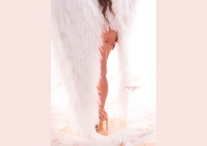 Sot and gentle wings boudoir captured by New Generation Portraits